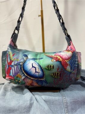 Anuschka Hand-Painted Sea Turtle Shoulder Bag in Teal, Blue, Pink fish sea life